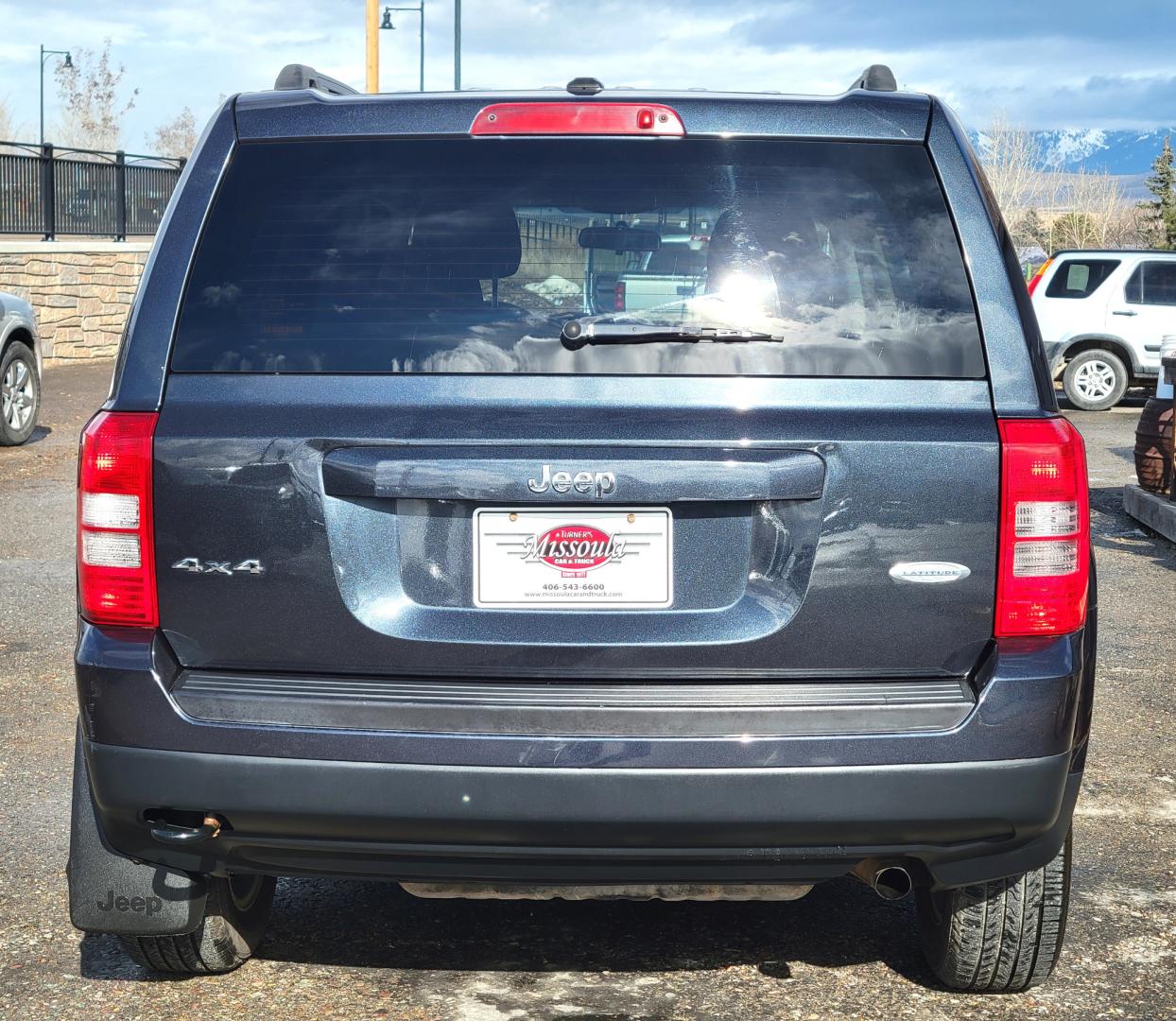 2014 Blue /Black Jeep Patriot Latittude (1C4NJRFB7ED) with an 2.4L I4 engine, 6 Speed Automatic transmission, located at 450 N Russell, Missoula, MT, 59801, (406) 543-6600, 46.874496, -114.017433 - Nice 4WD SUV. Heated Seats.6 Speed Automatic Transmission. 2.4L I4 Engine. Air. Cruise. Tilt. AM FM CD Satellite Radio. Firestone All-Season Tires. Power Windows and Locks. - Photo#5